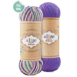 May include: Two balls of yarn, one purple and one with a multicoloured striped pattern. The yarn is labelled "alize Superwash Artisan" and "75% Wool".