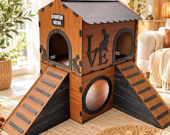 May include: A two-story wooden rabbit house with a dark gray roof, two ramps, and a circular ground-level entrance. The structure features a sign reading SEVENTEEN DESIGN, a cutout of the word LOVE with a rabbit silhouette, and rabbit cutouts.