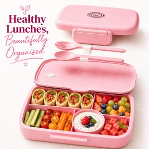 May include: A pink lunch box with a divided interior, containing wraps, fresh vegetables, fruits, and a dip. The lid is open, revealing a fork and spoon. Text on the image reads "Healthy Lunches, Beautifully Organised."