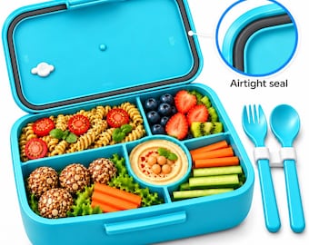 May include: A bright blue bento box with an open lid featuring a black airtight seal. The container has four compartments filled with pasta, meatballs, hummus, carrots, cucumbers, strawberries, and kiwi. A matching blue fork and spoon are included.