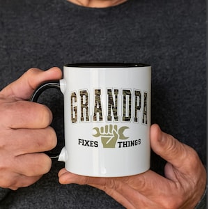 Grandpa Fixes Things Mug – Camo Print Gift for Handy Grandpas | Funny Father's Day Mug for Grandpa |Color Choice Handle Coffee Cup