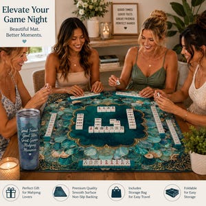 May include: Four women playing mahjong on a teal and gold mat with a seashell design. A tumbler with the text "Good Friends, Good Tiles, Great Games, Mahjong Memories" is on the table. The image includes the text "Elevate Your Game Night" and "Perfect Gift for Mahjong Lovers."