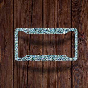 thumbnail image 2 of Ford Logo Embossed Mosaic Metal License Plate – Front Display 2 of 2
