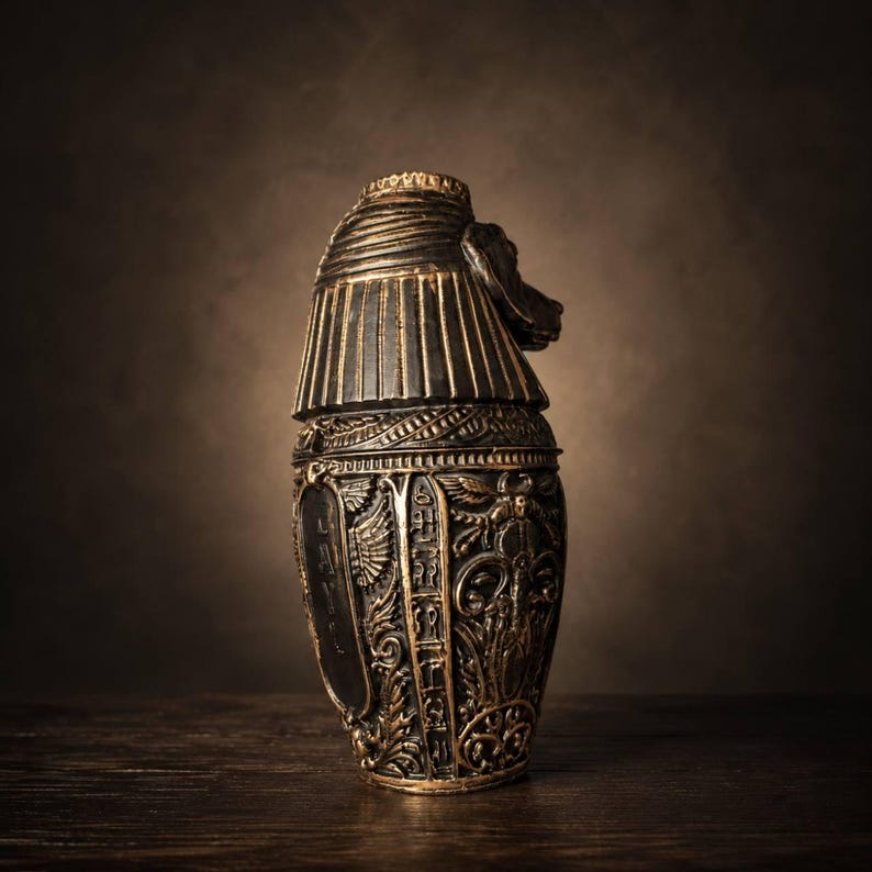 Back view of detailed cast stone canopic jar pet urn