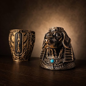 Sculpted dog head lid and urn base shown side by side
