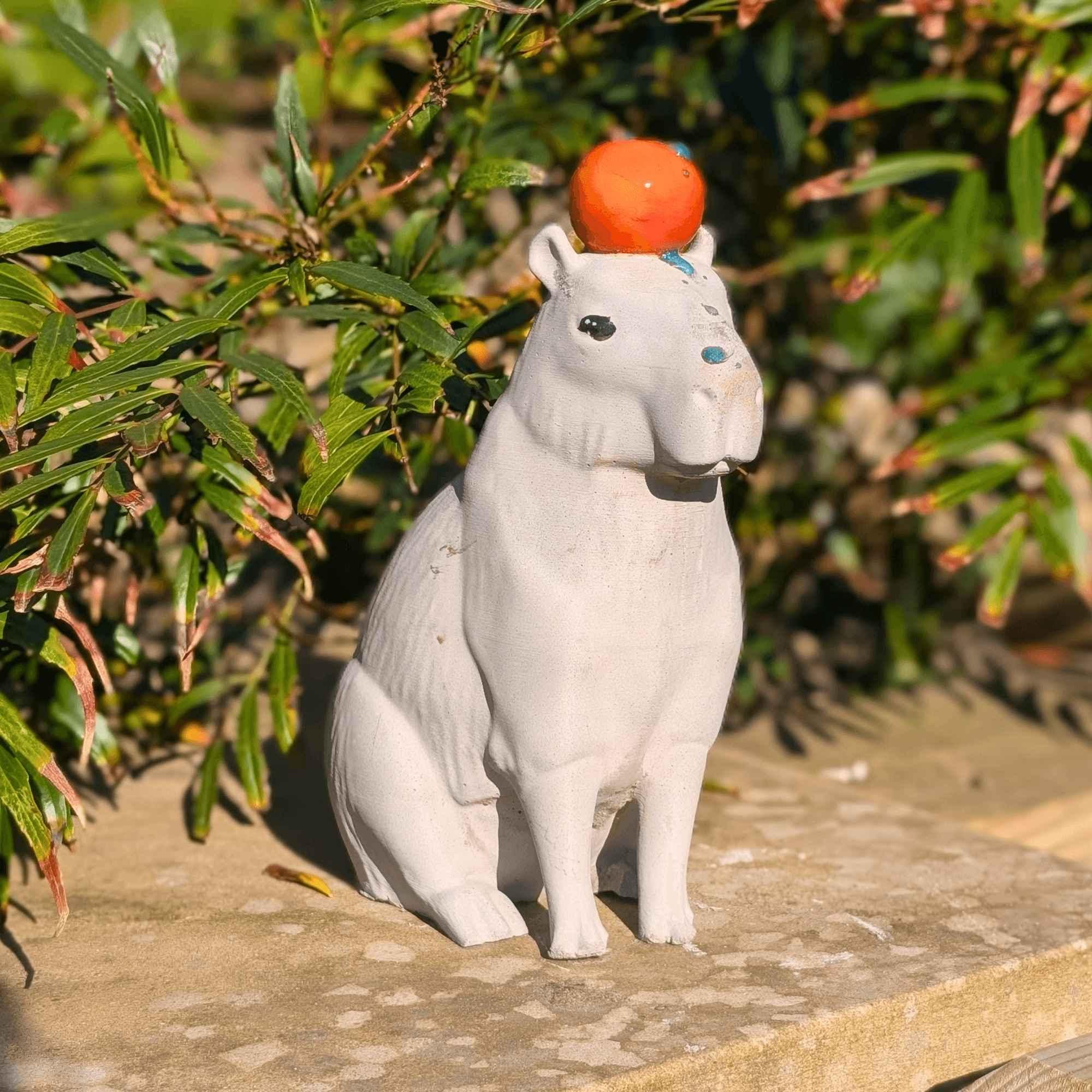 Capybara Concrete Sculpture With Orange | Quirky Garden Ornament