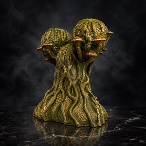 Back view of Mycelia cast stone mushroom head planter with root-like detail
