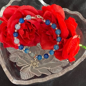 Handcrafted Wire Light and Dark Blue Bracelet with a Helm charm