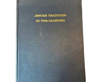 May include: A dark blue hardcover book with the title "Jewish Tradition in the Diaspora" printed in gold lettering on the front cover.
