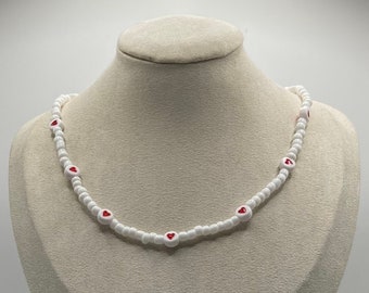 white and red heart choker