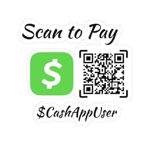 May include: A white sticker with the text "Scan to Pay" above a green square with a white dollar sign and a black and white QR code. Below is the text "$CashAppUser".