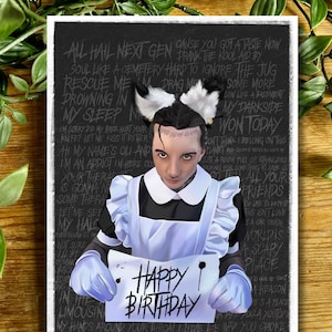 May include: A black and white illustration of a person wearing a maid outfit and holding a sign that says "Happy Birthday". The background is black with white text that includes song lyrics.