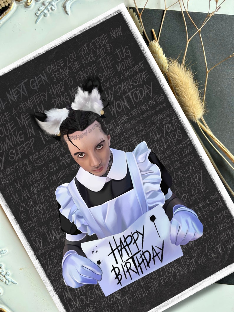 May include: A black and white birthday card featuring a drawing of a person in a maid's outfit holding a white card that says "Happy Birthday". The card has a black background with white text that says "Next Gen cause you got a taste now like a cemetery hard to ignore the jug own me in sleep" and more.