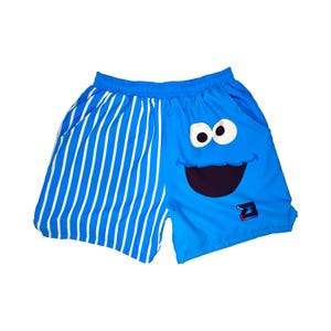 Pantalones cortos de secado rápido con rayas y personajes azules de Cookies