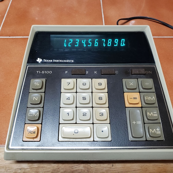 Calculatrice Texas Instruments TI-1025 Affichage bleu (1977