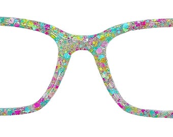 May include: A pair of eyeglasses with a colorful glitter design. The frames are covered in a mix of pink, blue, yellow, and silver glitter, creating a sparkling effect. The lenses are clear, and the overall shape is rectangular.