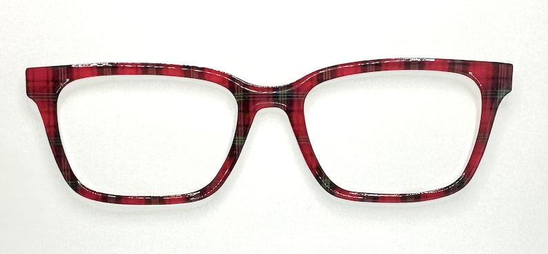 May include: Red and black plaid eyeglasses frames with a rectangular shape. The frames have a classic pattern and a glossy finish. The glasses are designed for vision correction.