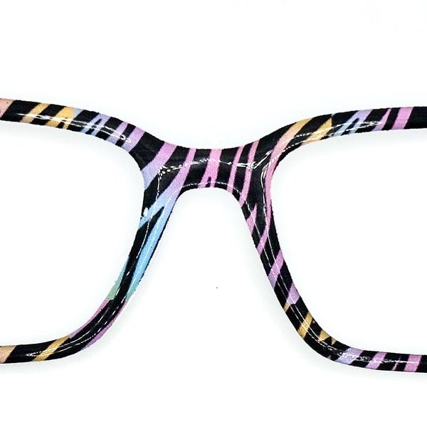 Copriocchiali magnetici da donna con motivo zebra arcobaleno.