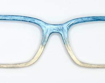 Women's Blue and Cream Holographic Snowflake Magnetic Eyeglass Toppers.