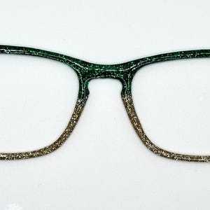 Women&#39;s Green and Gold Sparkle magnetic eyewear toppers for glasses such as Pair.