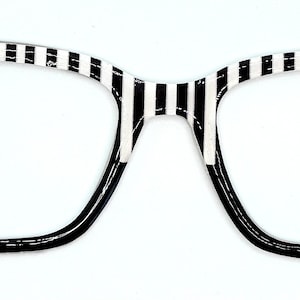 Black and white striped magnetic eyewear toppers for glasses such as Pair.