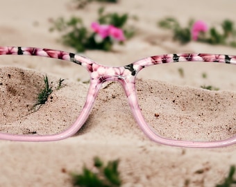 Adornos magnéticos para gafas con diseño de flor rosa hawaiana, como par.