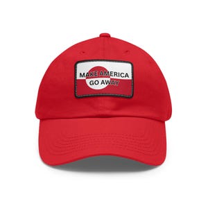 May include: A red baseball cap with a curved peak. The cap has a rectangular patch with the words "MAKE AMERICA GO AWAY" in white text. The patch also features a red and white design.