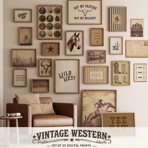 May include: A collection of 25 vintage western-themed digital prints in various sizes, framed and arranged on a wall. The prints feature cowboy hats, horses, cacti, and text like "Wild West" and "Yee". A brown leather armchair sits below.