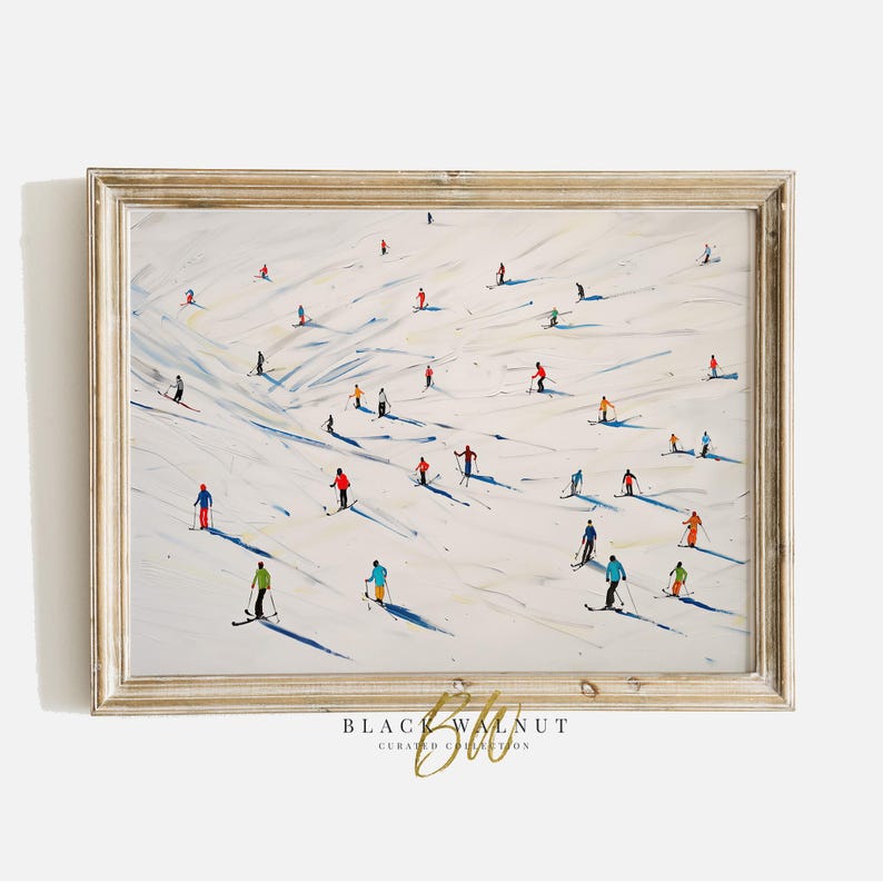 May include: A painting of a snowy mountain scene with skiers in colorful clothing. The skiers are spread out across the slope, creating a dynamic and lively composition. The painting is framed in a light wood frame.