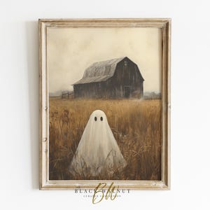 Peut inclure: Une peinture encadr&eacute;e repr&eacute;sentant un fant&ocirc;me blanc debout dans un champ d'herbe haute devant une grange d&eacute;labr&eacute;e. Le ciel est couvert et la sc&egrave;ne rappelle une ambiance d'Halloween effrayante.