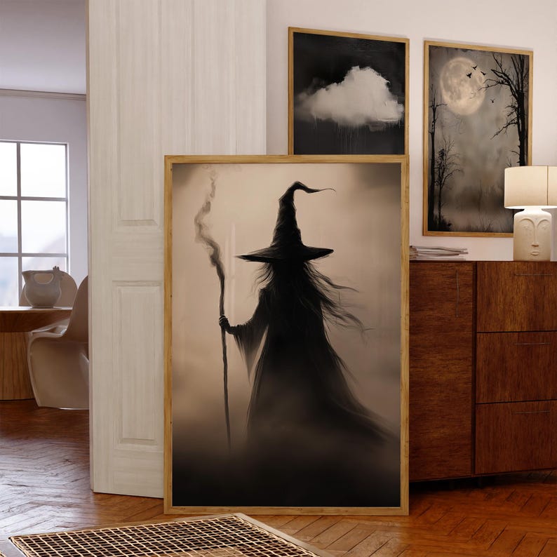 May include: A black and white illustration of a witch with a pointed hat and long flowing hair, holding a staff. The witch is standing in a misty forest setting.