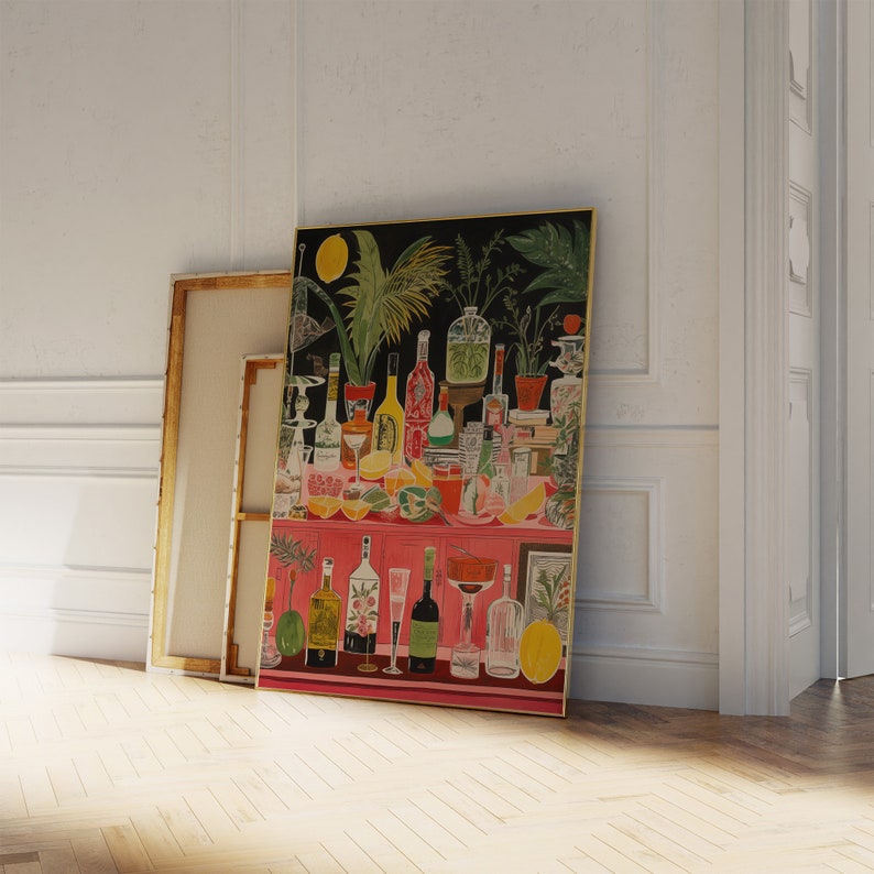 May include: A colorful painting of a still life featuring a variety of bottles, glasses, and fruit. The painting is set against a dark background and features a pink countertop. The painting is framed in gold.