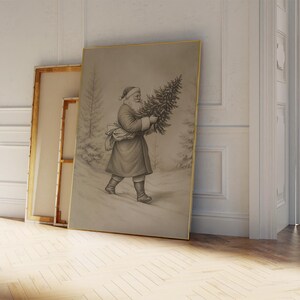 Może przedstawiać: Winietkowe czarno-białe ilustracje mężczyzny ubranego w Świętego Mikołaja niosącego choinkę. Ilustracja jest oprawiona w złotą ramę i wisi na białej ścianie.