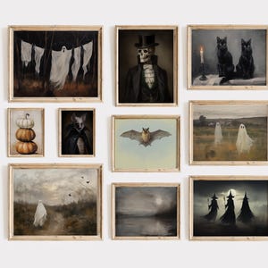 May include: A gallery wall set of ten framed art prints featuring Halloween themes including ghosts on a clothesline, a skeleton in a top hat, black cats, stacked pumpkins, a bat, a lone ghost in a field, and three witches under a full moon.