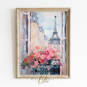 Puede incluir: Una pintura enmarcada que representa una escena callejera parisina con una vista de la Torre Eiffel a través de una ventana. Hay flores rosas en una maceta en un balcón.