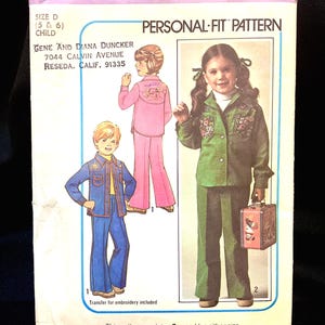 May include: Vintage Simplicity sewing pattern for children's clothing, featuring illustrations of a pink and green outfit. The pattern includes the text "PERSONAL-FIT PATTERN" and the size is D (5 & 6). The pattern also includes the text "Transfer for embroidery included".