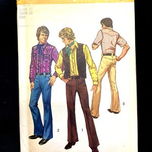 May include: Vintage Simplicity sewing pattern 5048 featuring illustrations of men's clothing. The pattern includes a purple patterned shirt, a yellow shirt with a black vest, and a striped shirt. The pattern size is 44 chest and 39 waist.