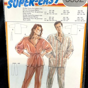 May include: A Burda Super Easy sewing pattern packet, featuring a woman and a man in pajama sets. The packet has the number 5592 and includes size charts. The woman is wearing a peach-colored pajama set, and the man is wearing a patterned pajama set.
