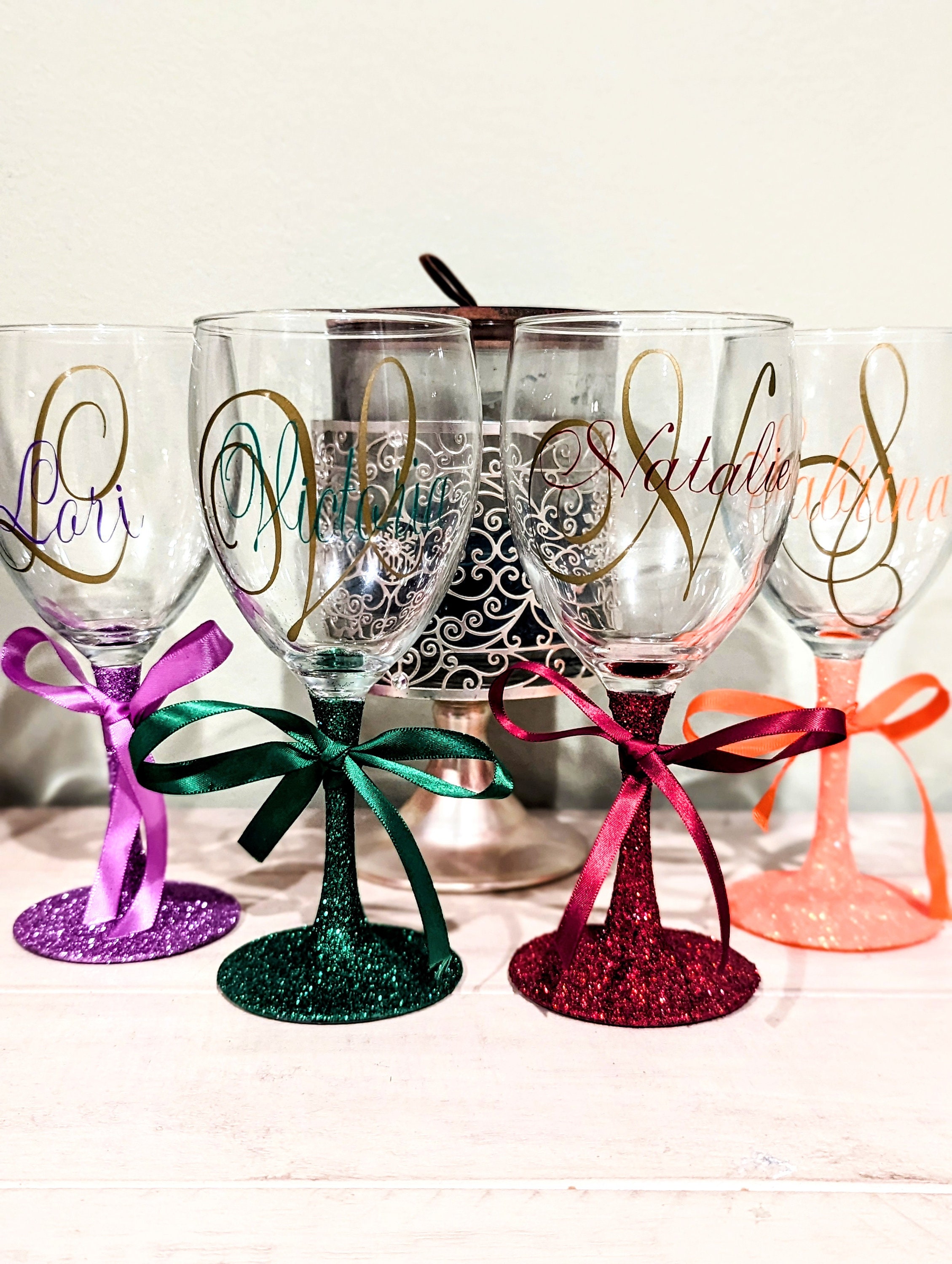 Cute Personalized Wine Glasses for 2 w/glitter bottom. Initial on the front  w/short saying on the back. Choose your colors. Great Gift Idea!