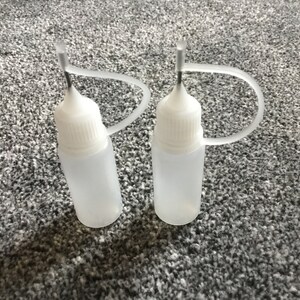 2 liquid bottle feeders