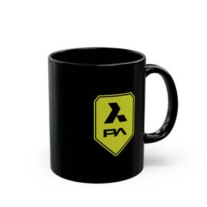 May include: Black ceramic coffee mug with a yellow and black logo. The logo is a shield shape with the letters "PA" and a stylized arrow. The mug has a curved handle.