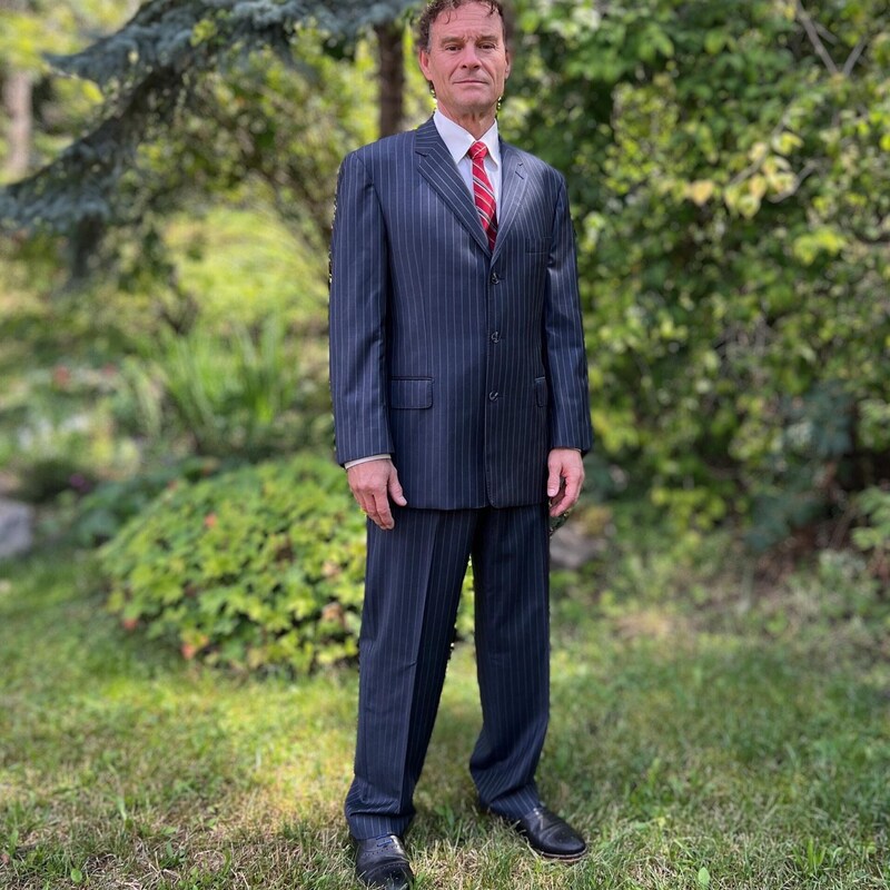 pinstripe suit with striped tie