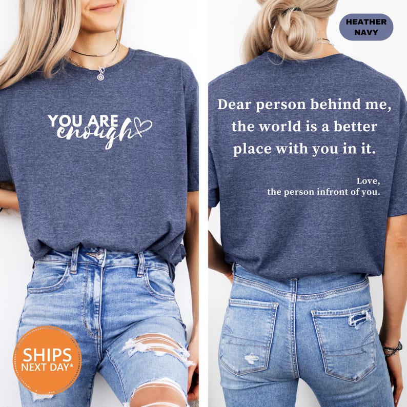 a woman wearing a t - shirt with a message on it