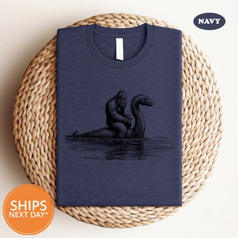 a t - shirt with a picture of a black swan on it