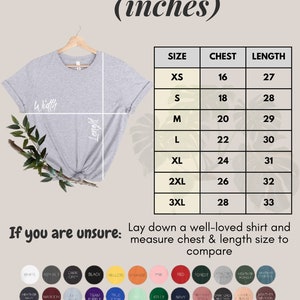 May include: A gray t-shirt size chart with measurements in inches. The chart shows the chest and length measurements for sizes XS to 3XL. The text "If you are unsure: Lay down a well-loved shirt and measure chest & length size to compare" is below the chart.