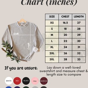 May include: A size chart for sweatshirts in inches. The chart shows the chest and length measurements for sizes XS to 3XL. The chart also includes a gray sweatshirt with measurements labeled "Width" and "Length".
