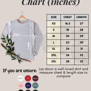 May include: A size chart for long-sleeve shirts, showing chest and length measurements in inches for sizes XS to 3XL. The chart is on a light brown background with a green plant in the corner.
