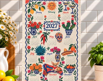 May include: A cream-colored 2027 calendar tea towel featuring a decorative border and twelve monthly grids. Illustrations include lemons, a sun, margaritas, cacti, a sugar skull, chili peppers, a sombrero, a chihuahua, and floral motifs.