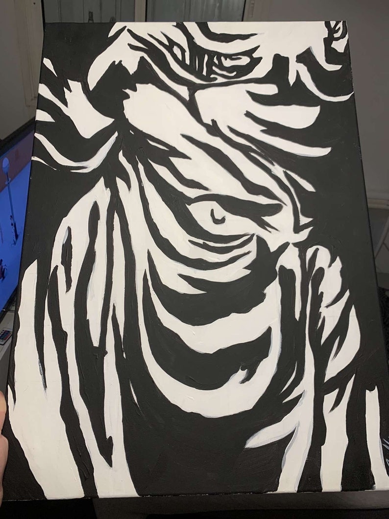 May include: Black and white abstract painting on canvas. The painting features bold, sweeping strokes that create a sense of movement and energy.
