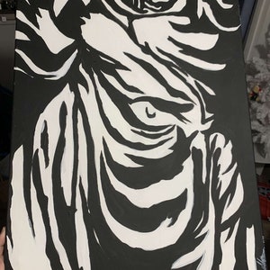 May include: Black and white abstract painting on canvas with bold, swirling lines and shapes.
